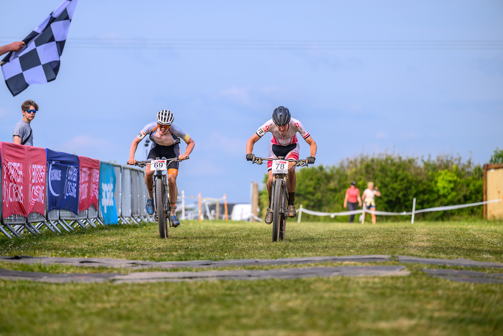 One of many sprint finishes of the weekend Charles Hart and Harry Howlett took it to the line in the Men s Junior race with Charles pipping Harry to ninth place and Harry rounding off the top ten