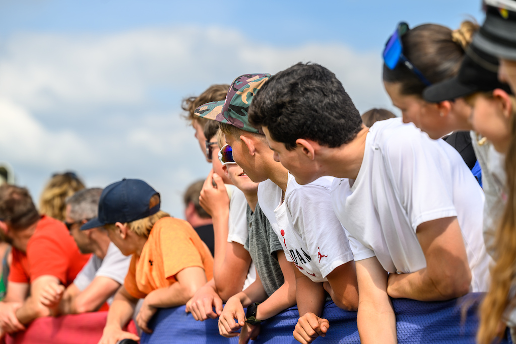 The Youth riders having recovered from their race early in the day gathered at the finishing line to catch up on the action