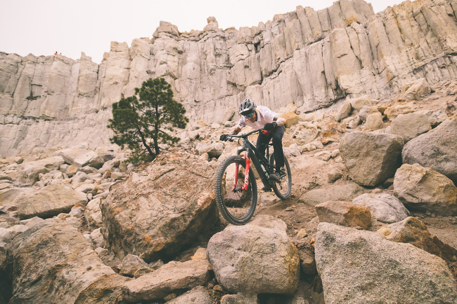 Criterium Bike Shop employee Justin Martin navigates a steep rocky line on Black Sheep Trail at Austin Bluffs Open Space in Colorado Springs Colorado.