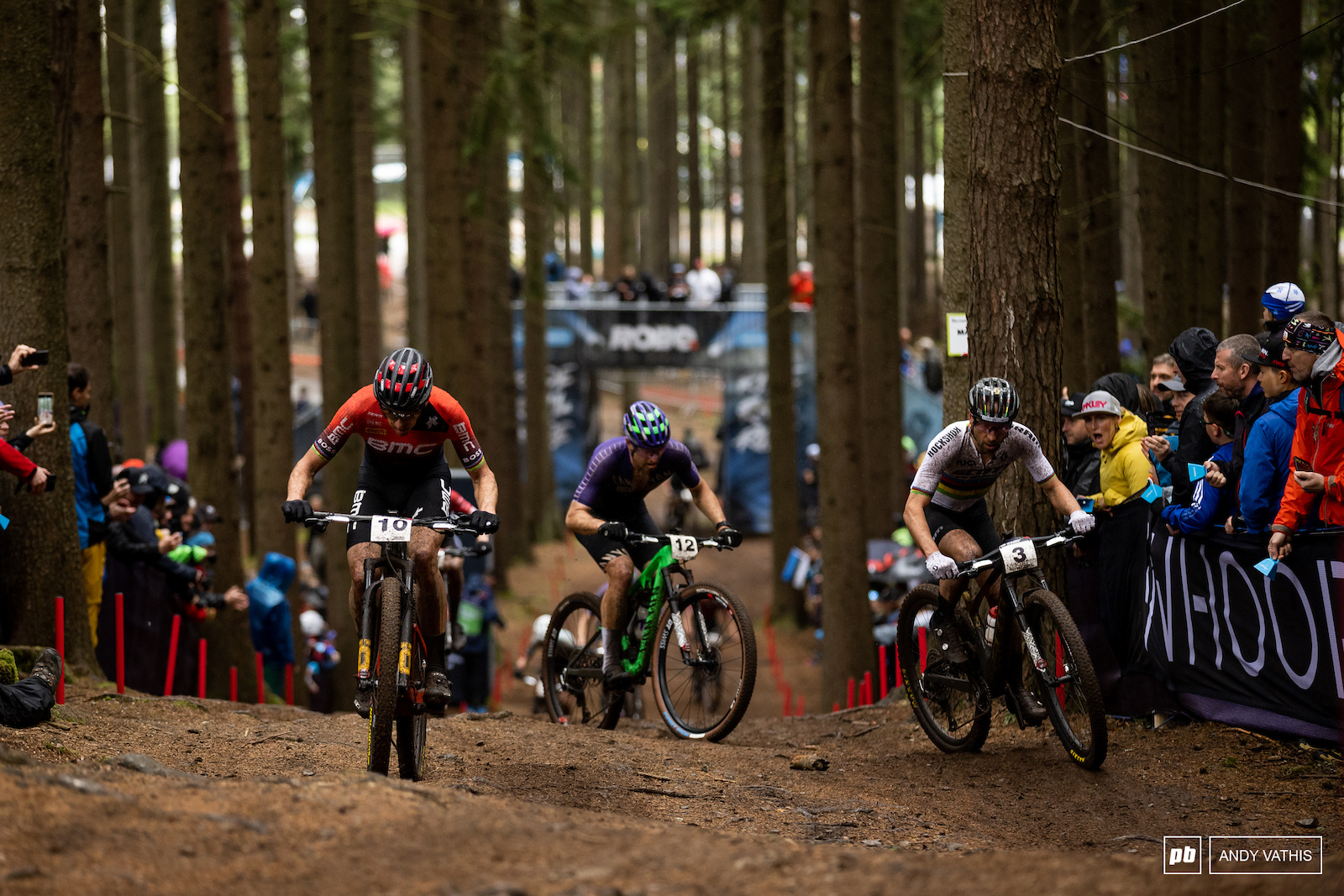 The chase group of Sarrou Schurter and Schwarzbauer grinding up the classic climb.