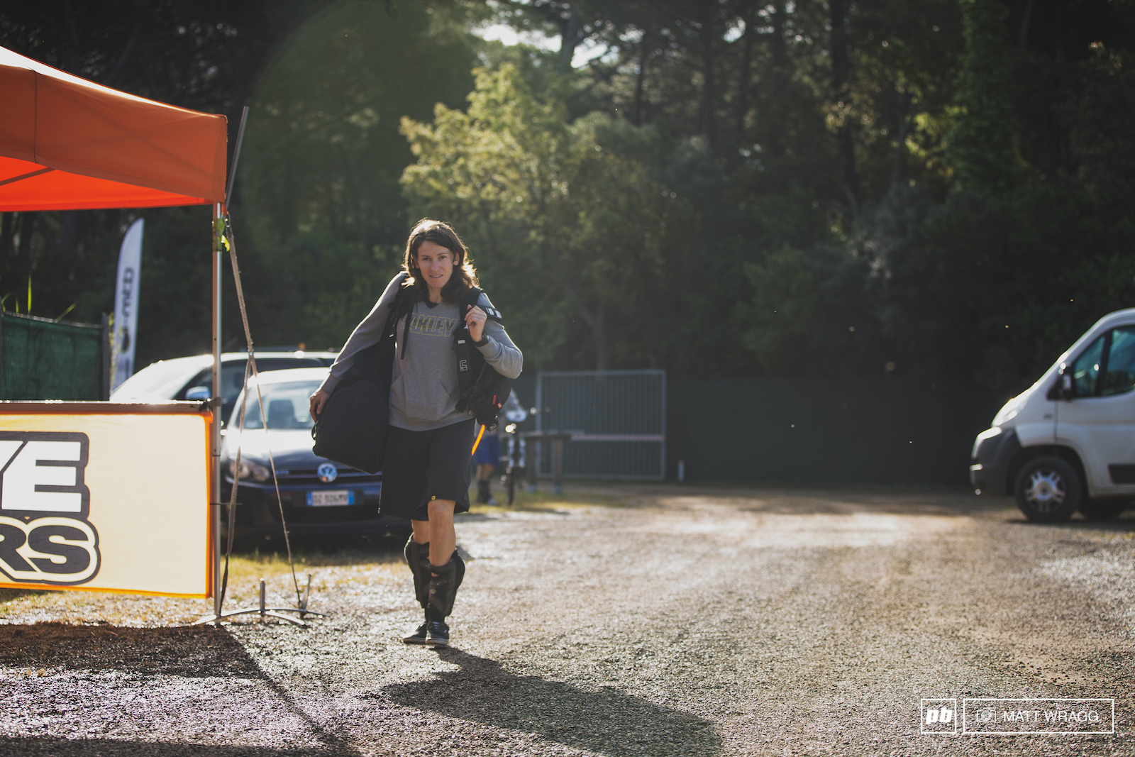 Anne-Caroline Chausson heads for the pits to start the day. Whiel she was to become one of the sport s frontrunners this first race ended in mechanical woe for her.