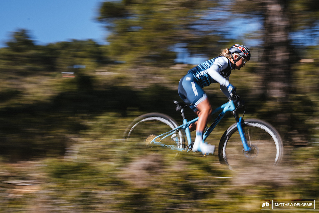 Emily Batty speeds through the Spanish pines.