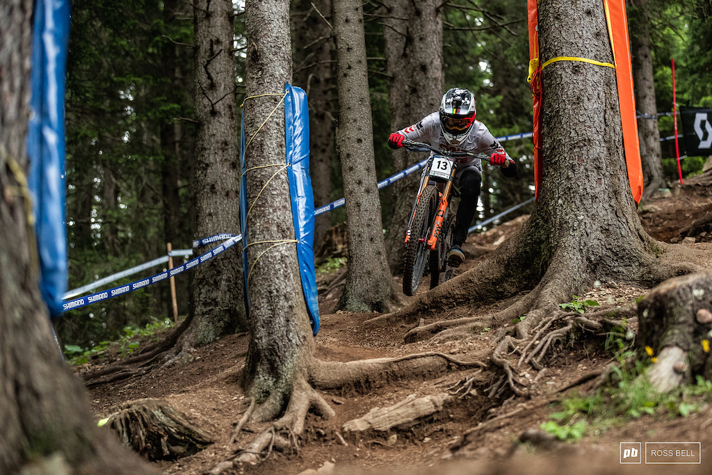 Greg Minnaar charging through some rough stuff.