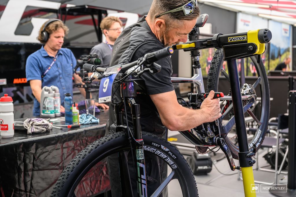 Last minute bolt check before the Ghost team headed out for practice