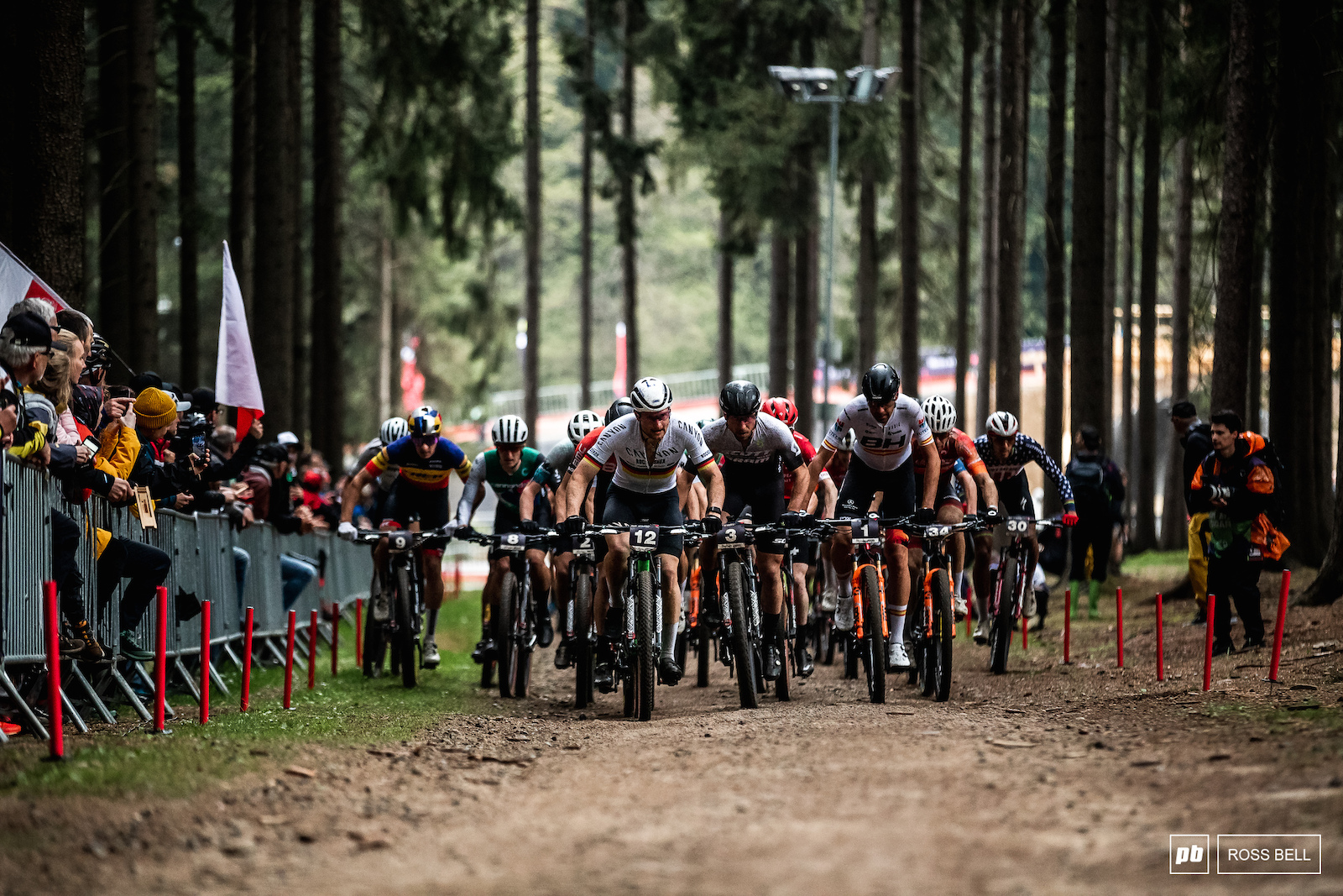 The pack heads up the climb at the far end of the course.