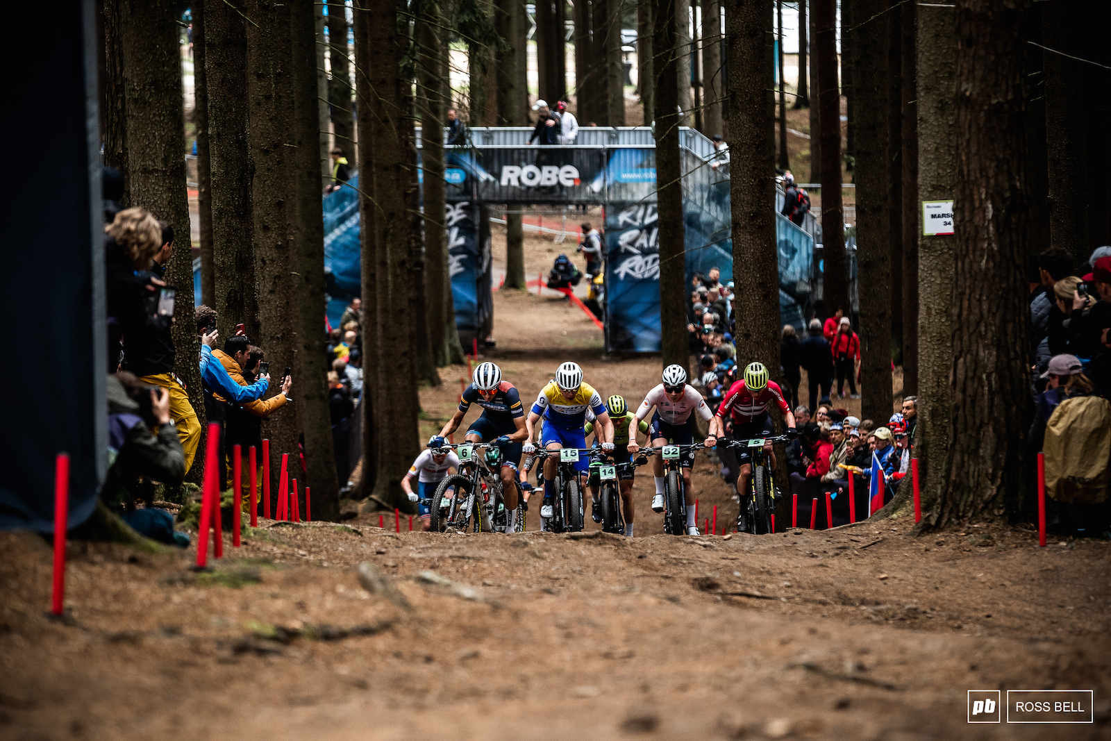 Riley Amos leads the U23 men up the long climb in the centre of the Nove Mesto course.